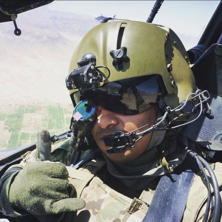 Cheffren Canady in an AH-64D cockpit during operations in Afghanistan
